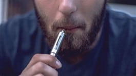 man using e cigarette